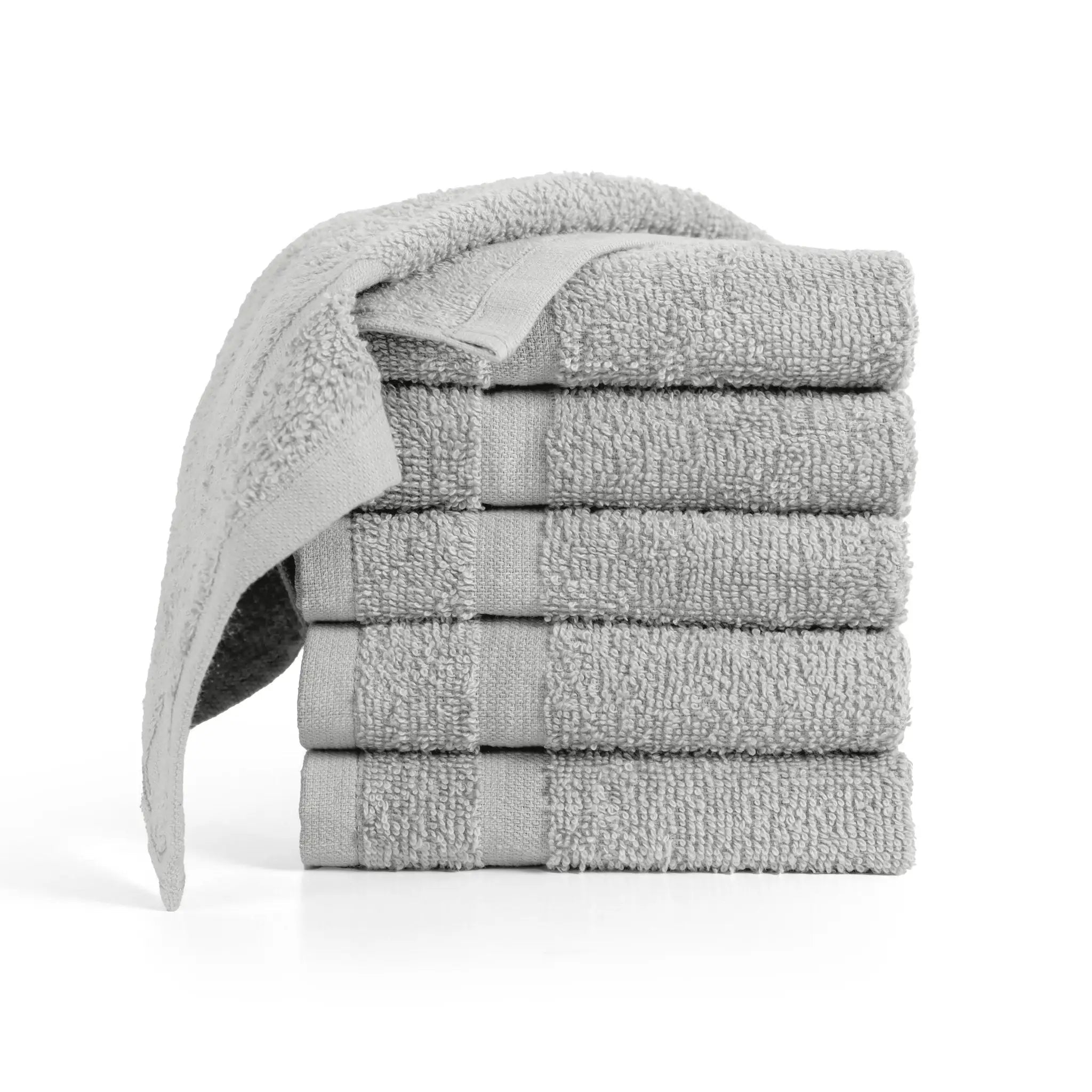 Stack of gray washcloths on a white background