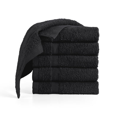 Stack of black washcloth on a white background