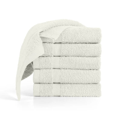 A stack of ivory washcloth with one washcloth draped over the top, on a clean white background.