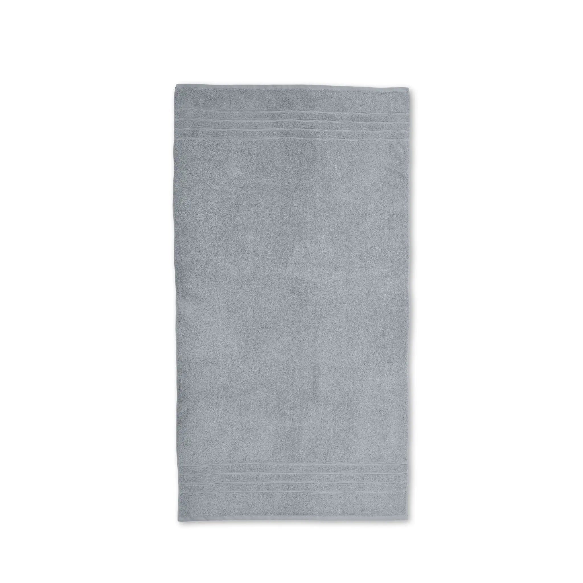 Spa blue towel on a white background