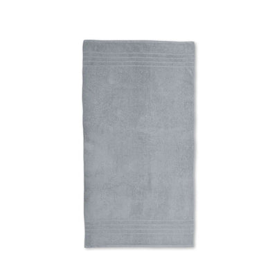 Spa blue towel on a white background