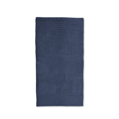 A single folded estate blue bath towel shown flat against a solid white background.