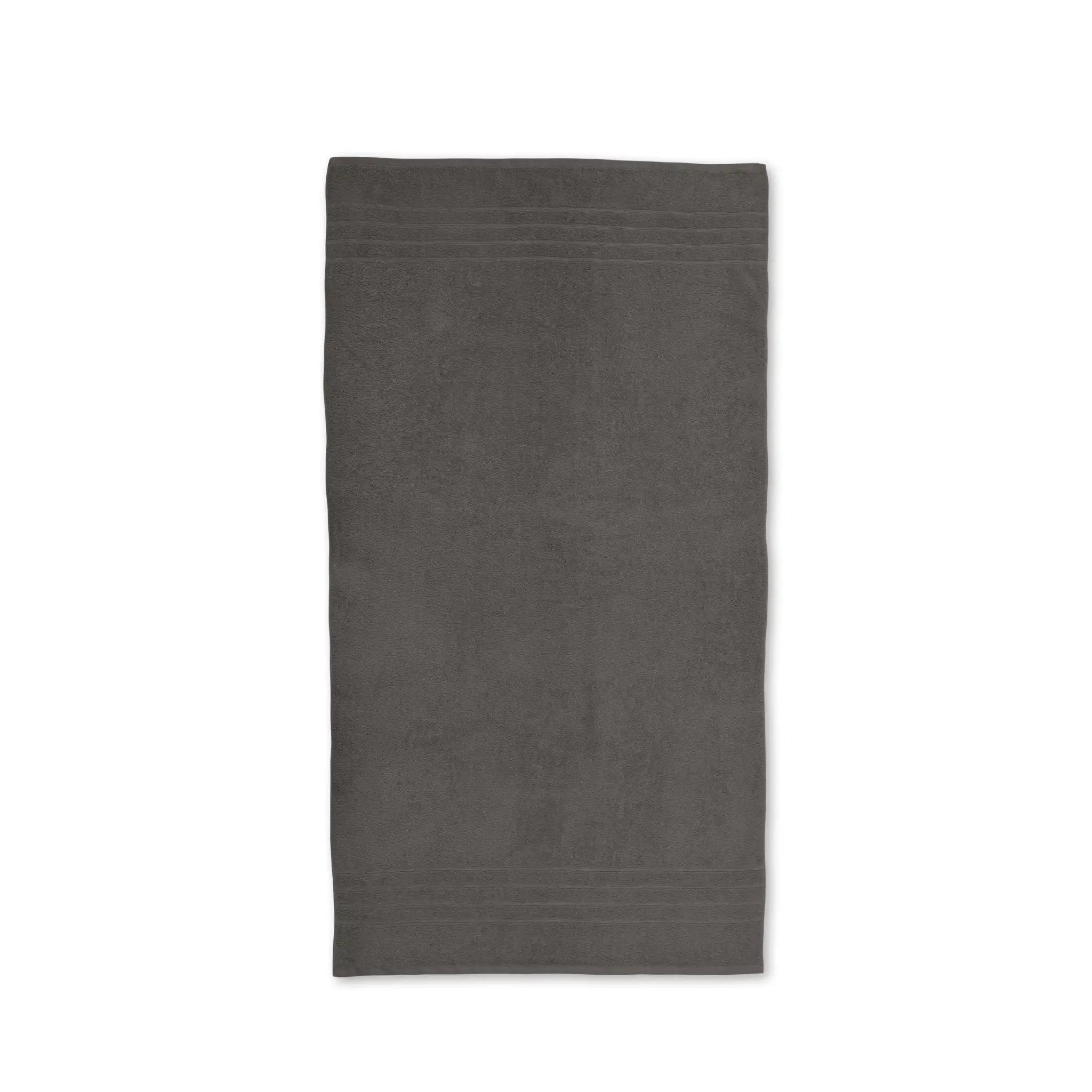 A charcoal colored bath towel shown flat against a plain white background.