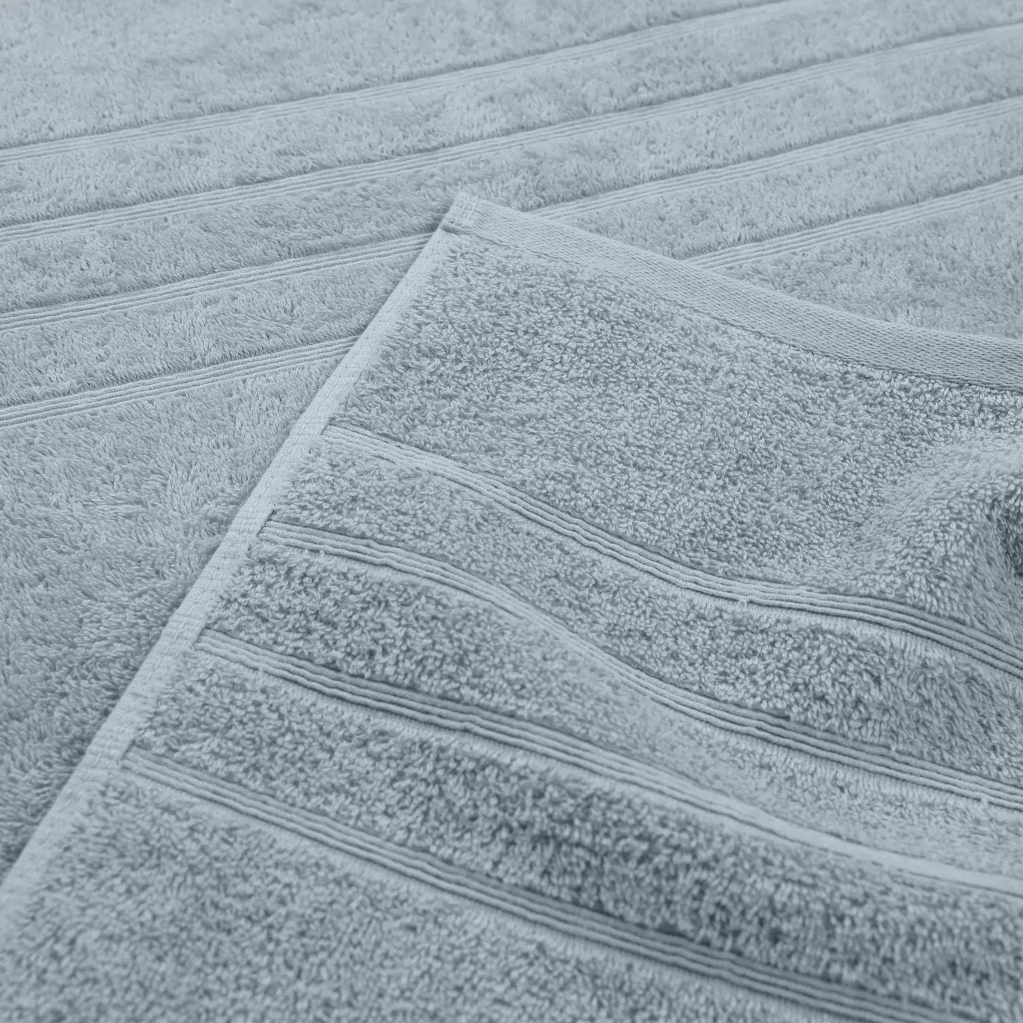 Close-up of textured spa blue fabric with a pattern