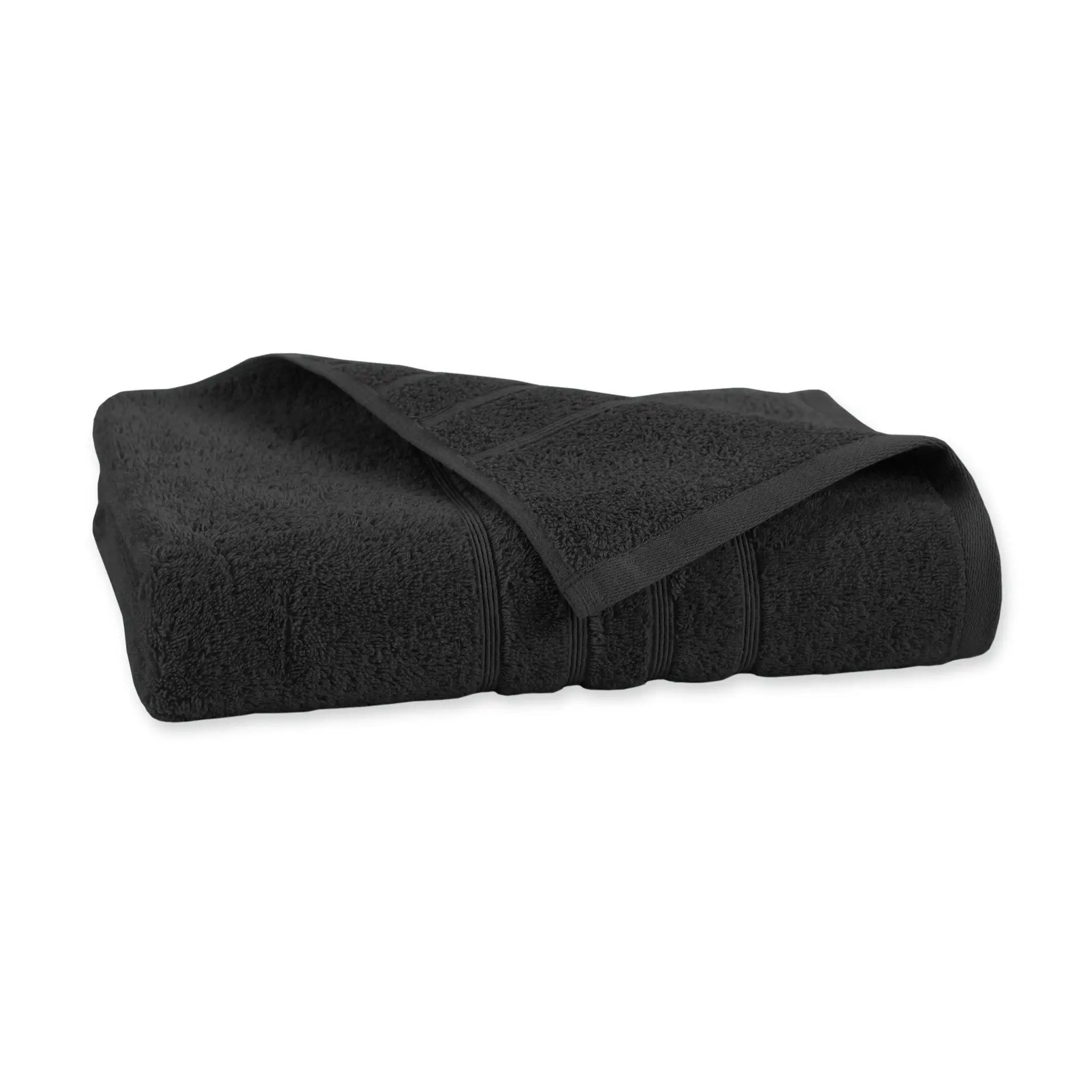 Black bath towel folded neatly on a white background