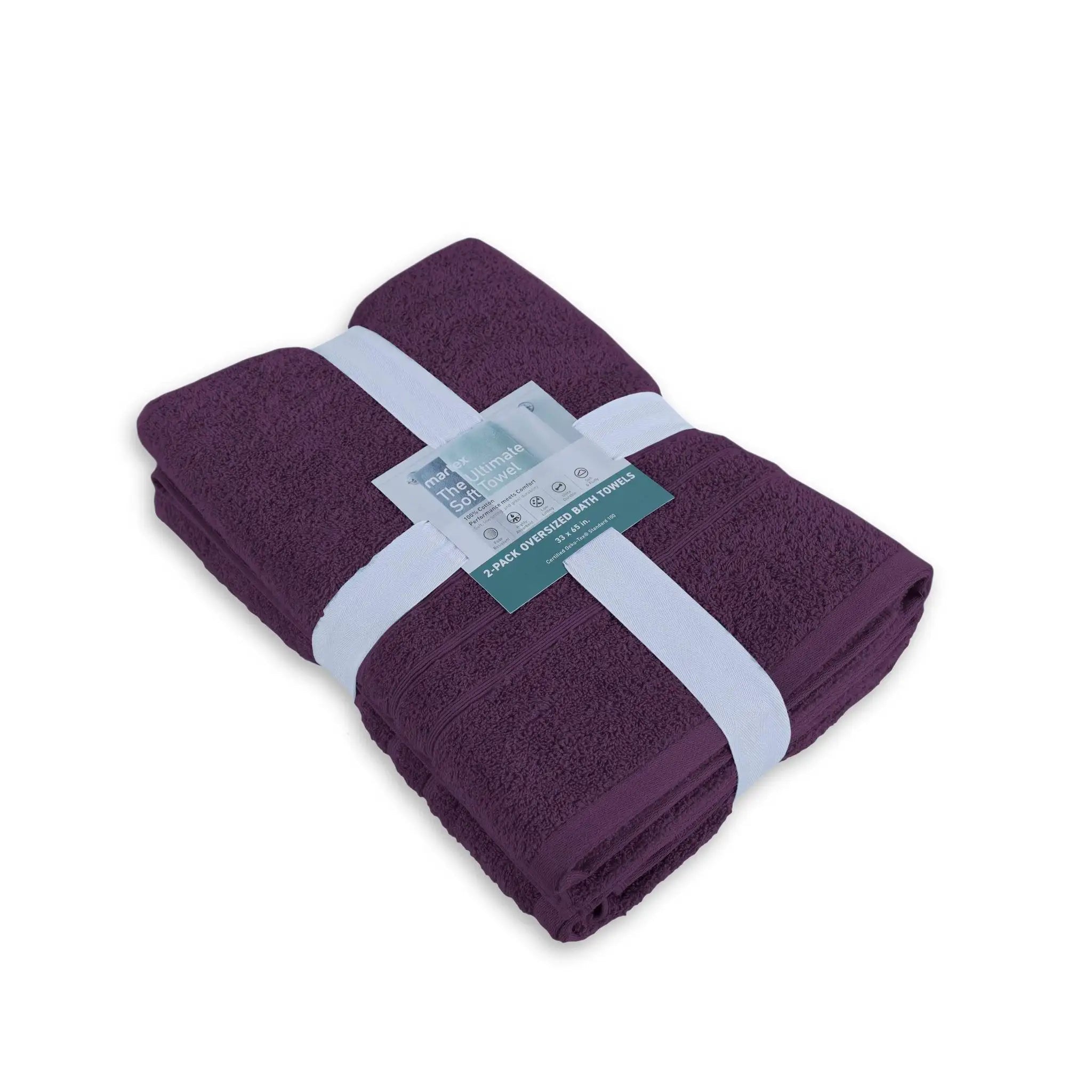 Folded purple bath sheet with a label on a white background