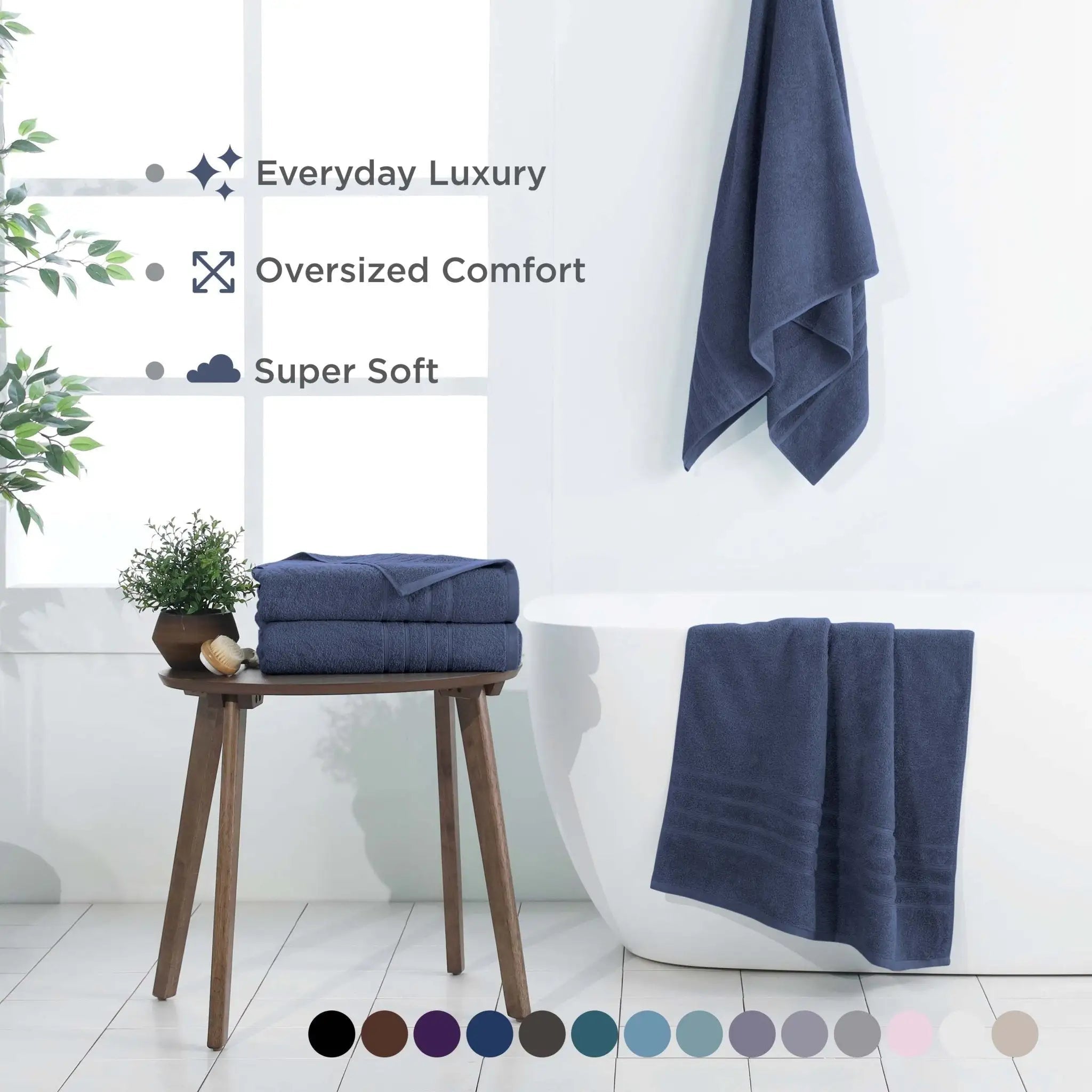 Estate blue bath sheets displayed in a bathroom setting with text highlighting features.