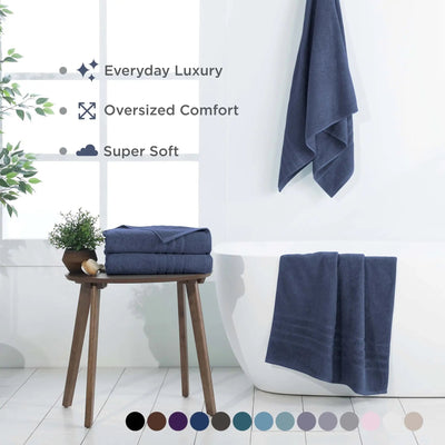 Estate blue bath sheets displayed in a bathroom setting with text highlighting features.