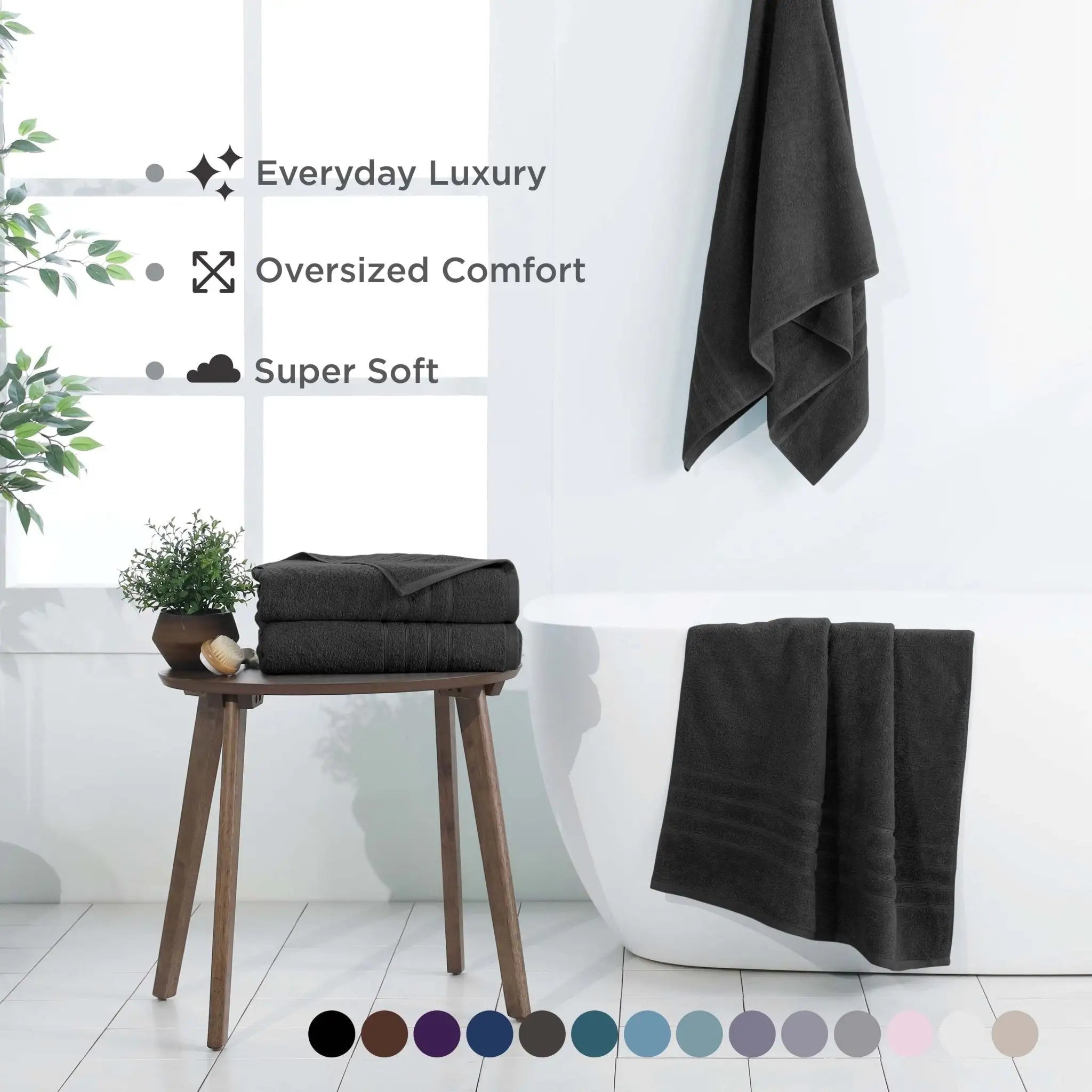 Black bath sheets displayed in a bathroom setting with text highlighting features.