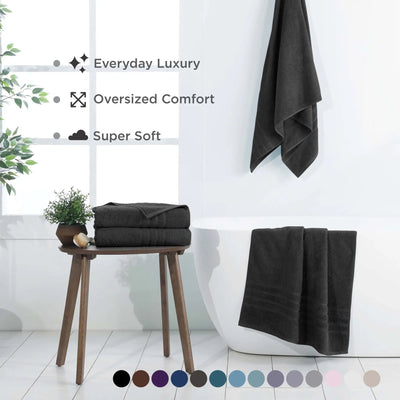 Black bath sheets displayed in a bathroom setting with text highlighting features.