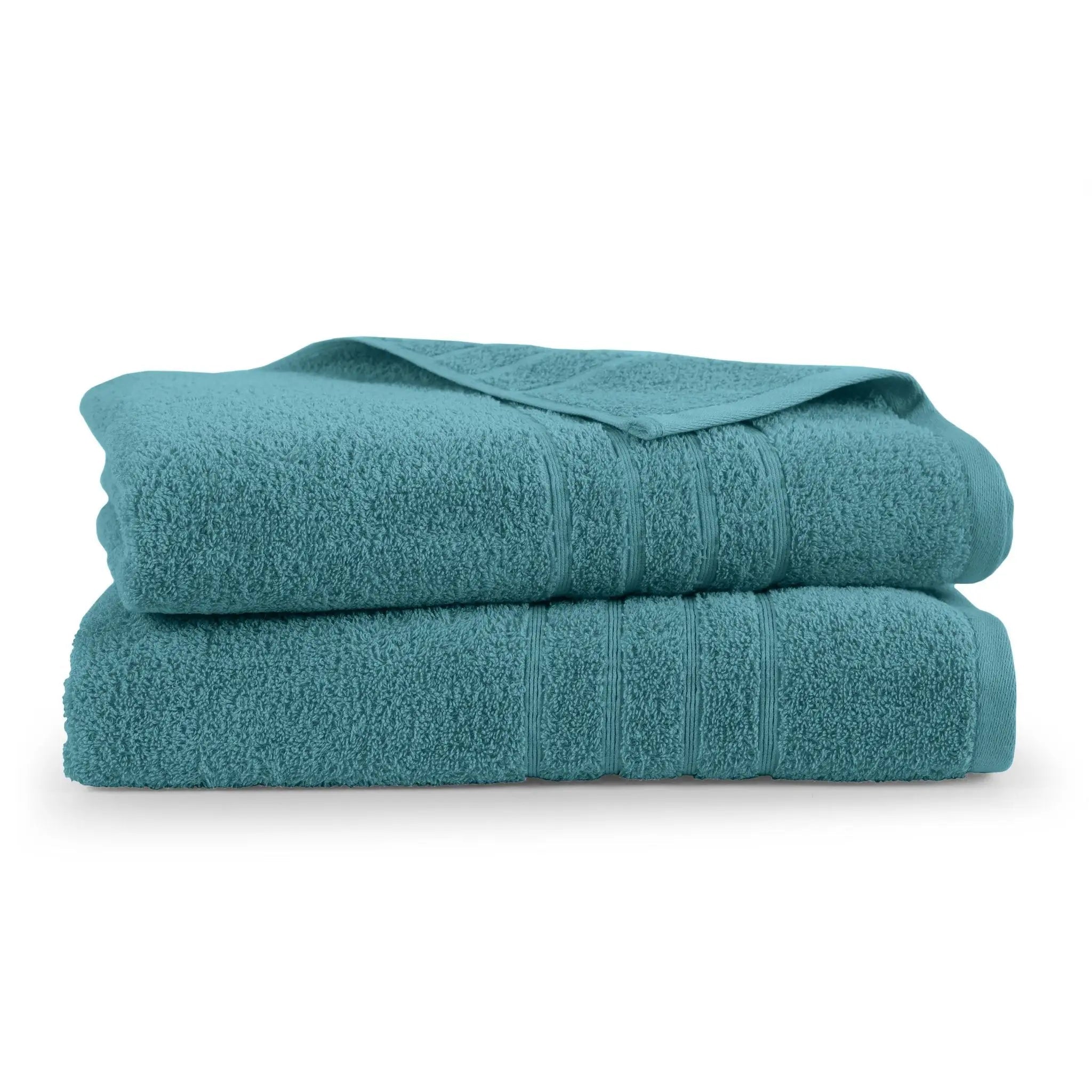 Two teal bath sheets stacked on a white background