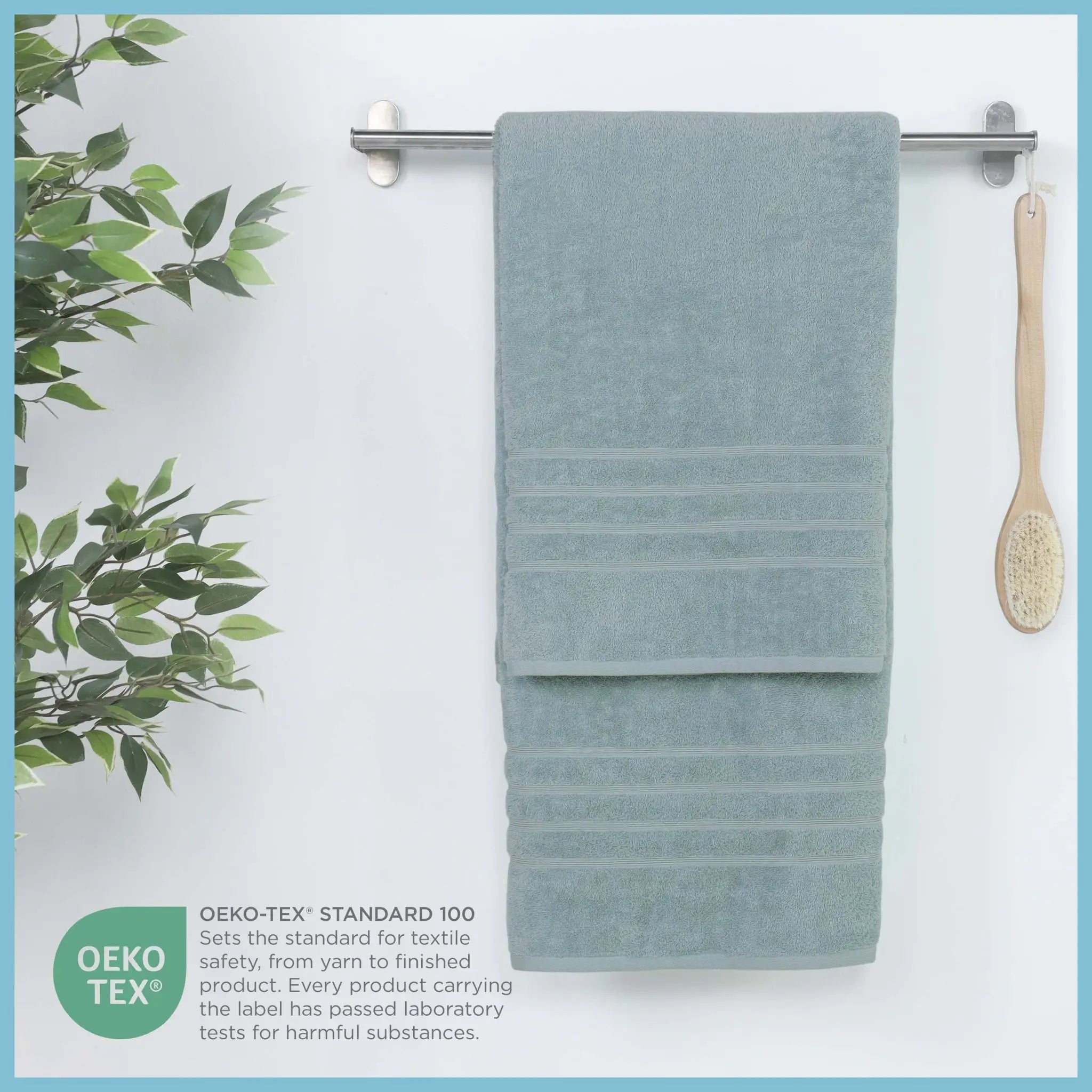 Mineral colored bath sheet hanging on a rack in the background, featuring OEKO-TEX certification.