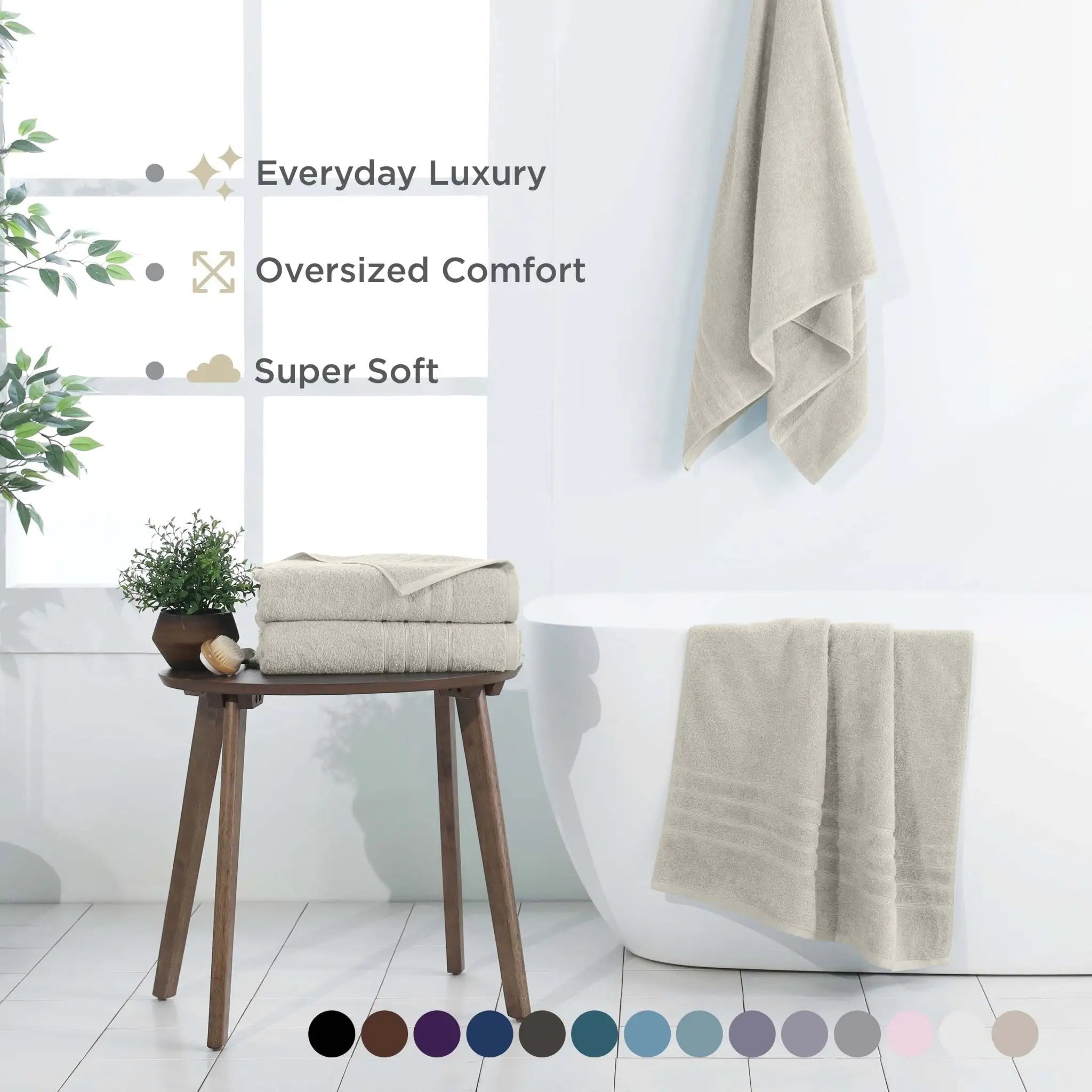 Bathroom scene with sand-colored bath sheets.