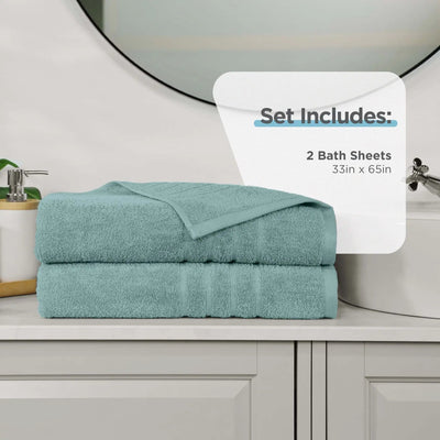 Two folded mineral colored bath sheets stacked on a bathroom counter, with a white informational overlay that reads 'Set Includes: 2 Bath Sheets 33in x 65in'.