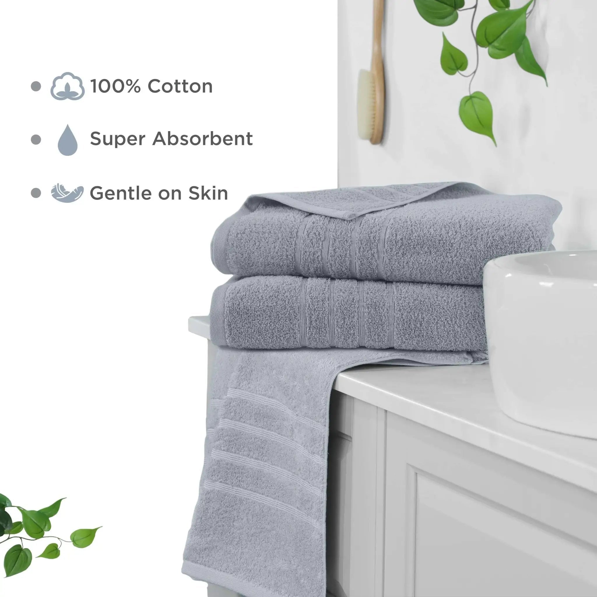 Spa blue bath sheets on a bathroom counter with text highlighting features like 100% cotton, super absorbent, and gentle on skin.
