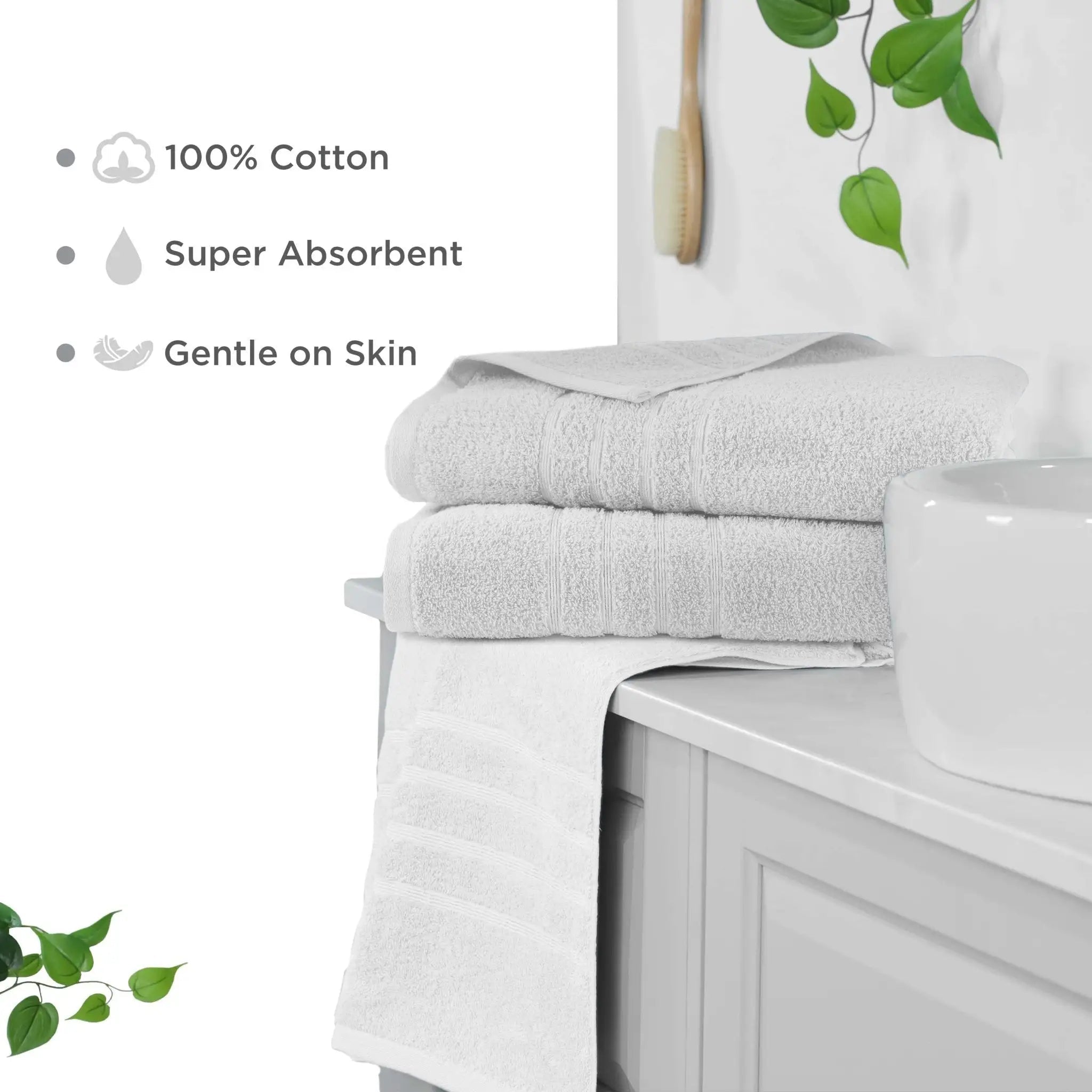Two folded light white cotton bath sheets stacked on a white bathroom vanity. Text on the left lists product benefits: 100% cotton, super absorbent, and gentle on skin.