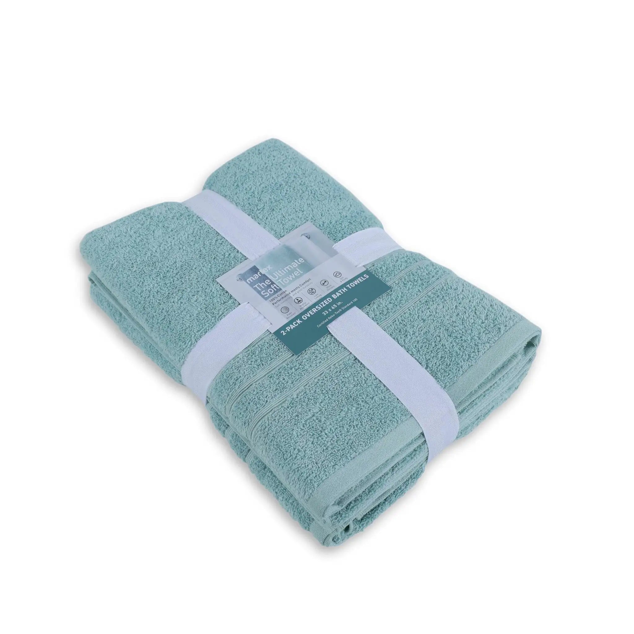 Folded mineral colored bath sheet with a label on a white background