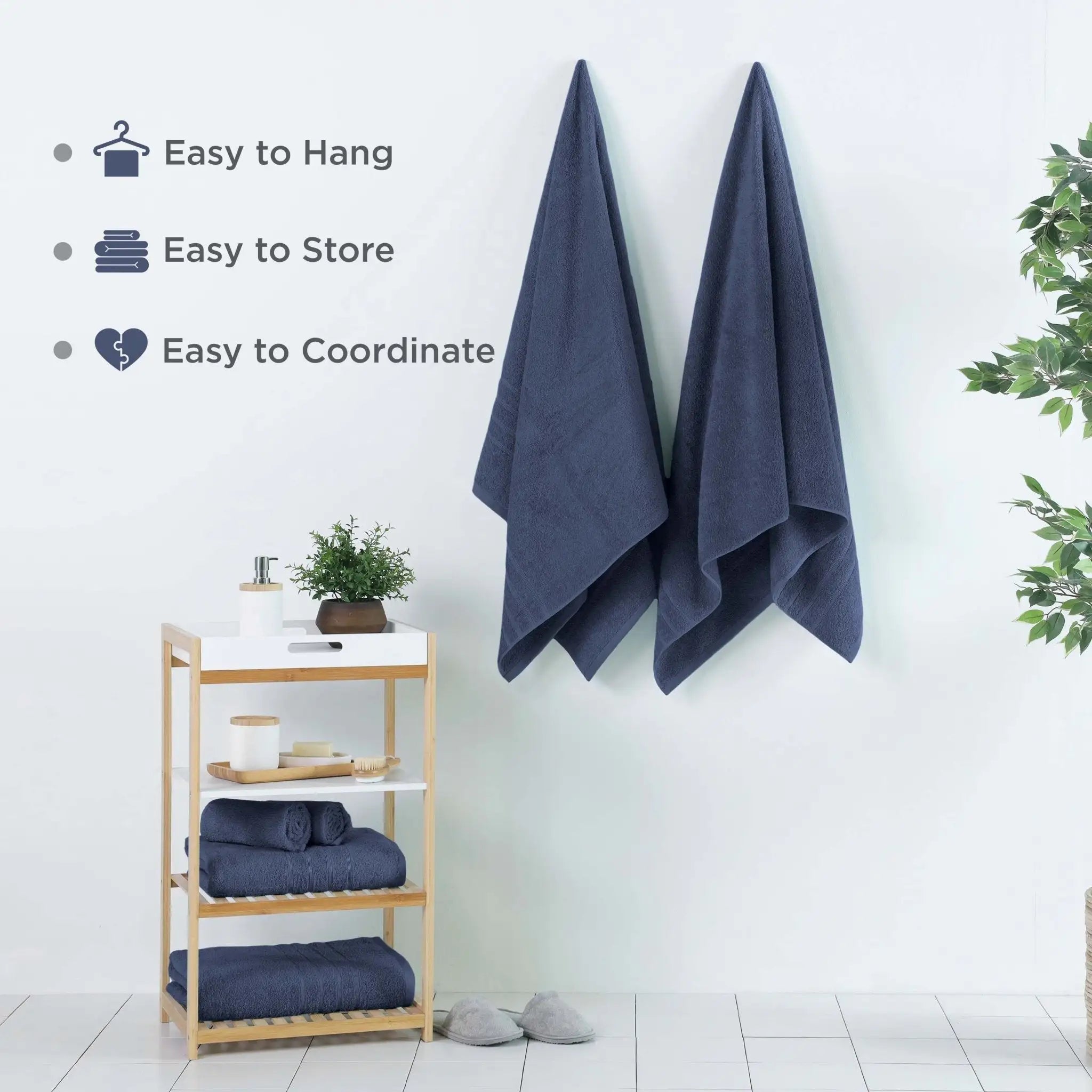 Estate blue bath sheets hanging on a rack with text indicating ease of use.