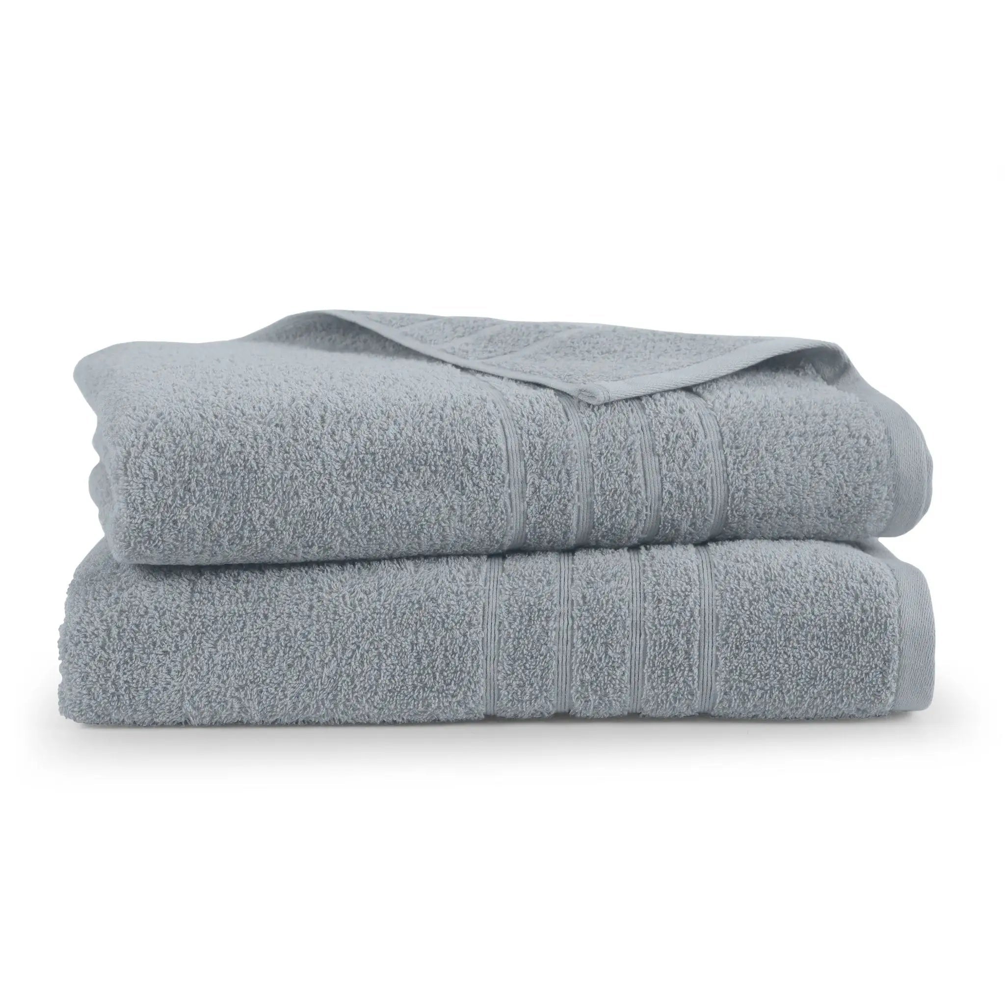 A stack of two folded bath towels in a spa blue color, showing their textured terry cloth weave and ribbed borders, set against a plain white background.