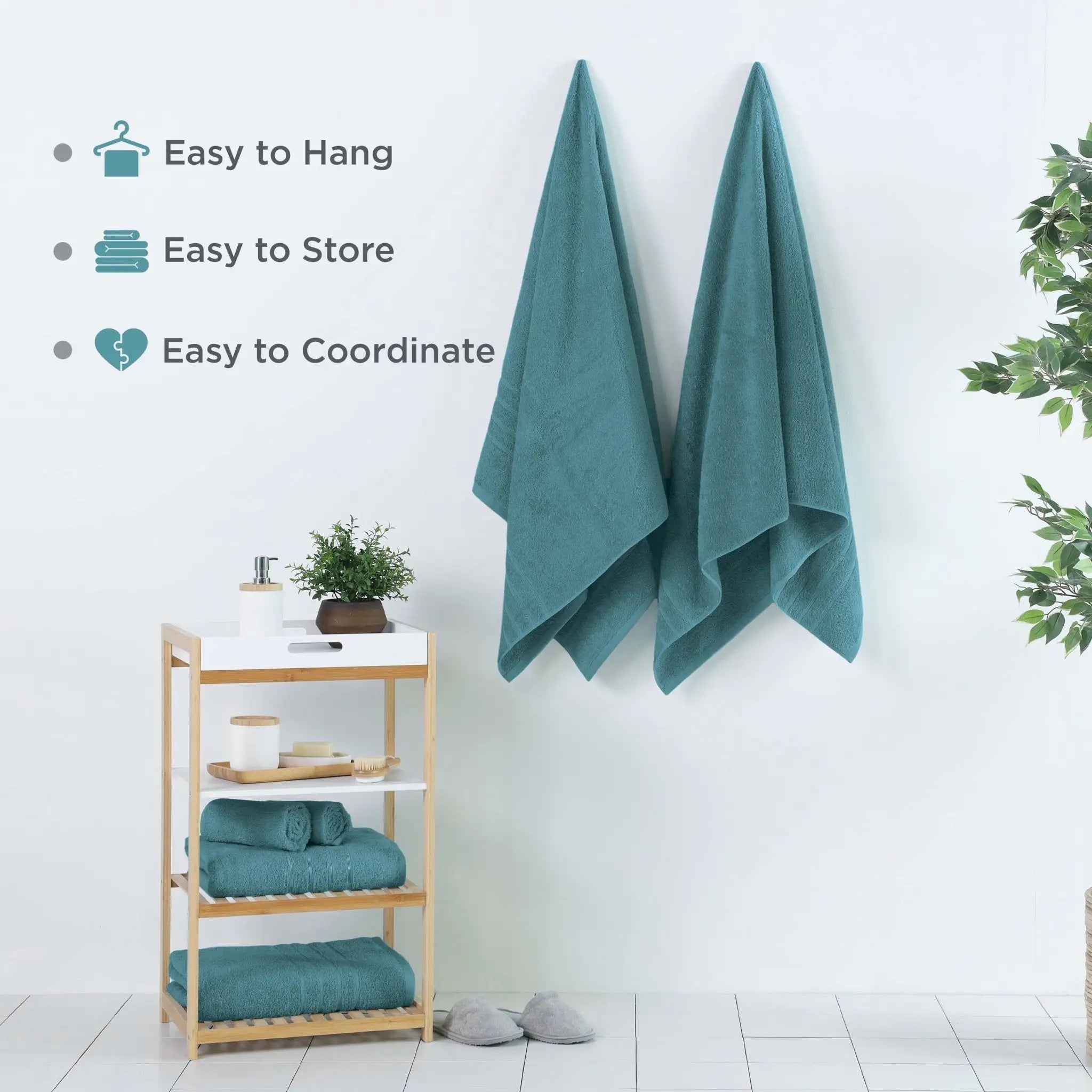 Teal bath sheets hanging on a rack with text indicating ease of use.