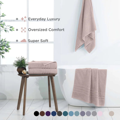 A set of soft, oversized bath sheets in a pink color.
