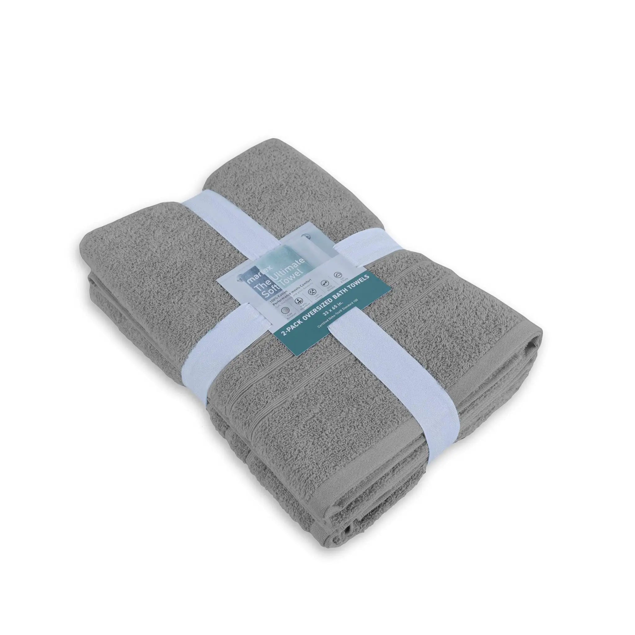 Folded gray bath sheet with a label on a white background