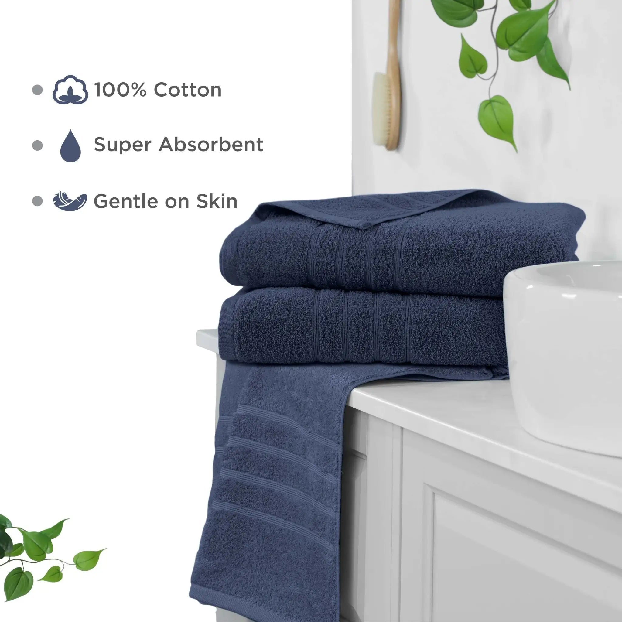 Estate blue bath sheets on a white cabinet with text highlighting features like 100% cotton, super absorbent, and gentle on skin.