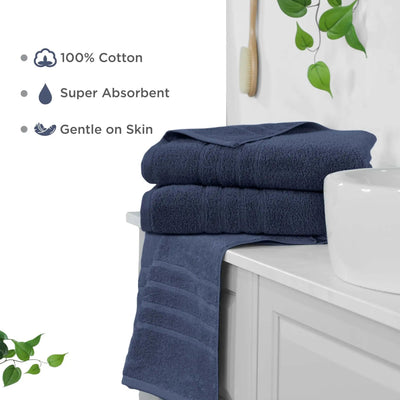 Estate blue bath sheets on a white cabinet with text highlighting features like 100% cotton, super absorbent, and gentle on skin.