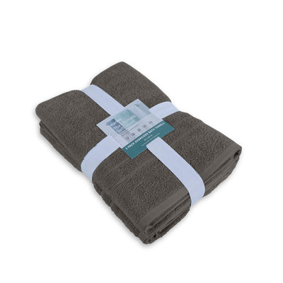Folded Eiffel tower bath sheets with a label on a white background