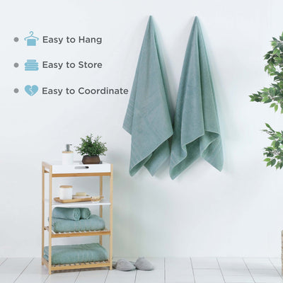 Mineral bath sheets hanging on a wall, featuring text about towel features.