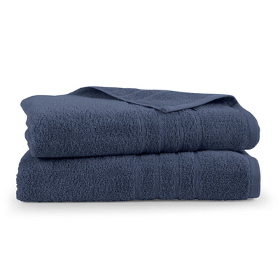 Two folded estate blue bath sheets on a white background