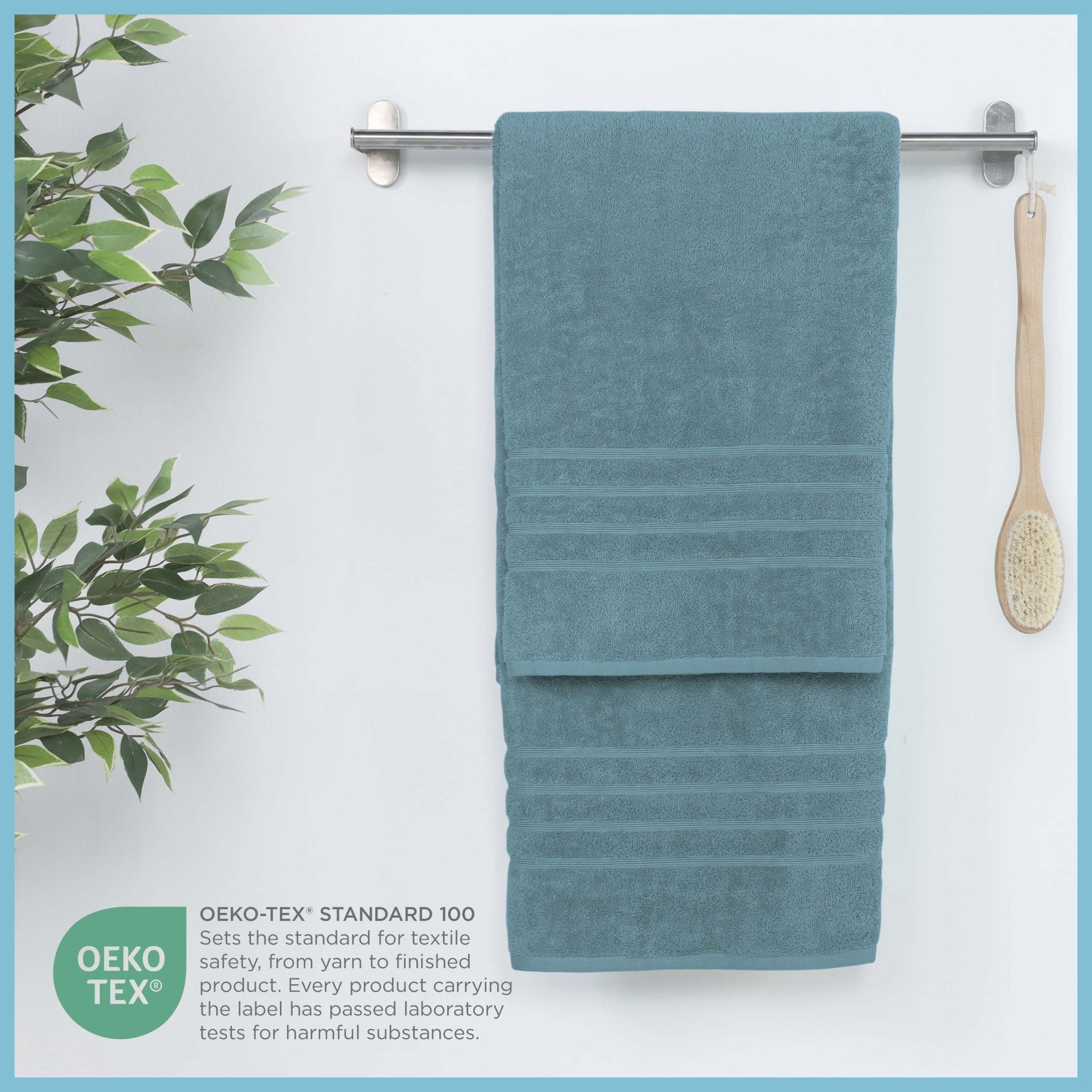 Larkspur Teal bath sheet hanging on a rack, featuring OEKO-TEX certification.