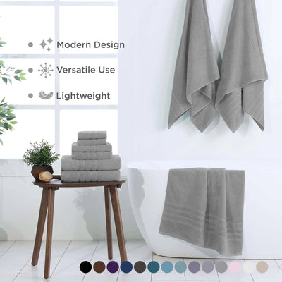 Grey towels displayed on a wooden stool and hanging on a white wall with text highlighting features.
