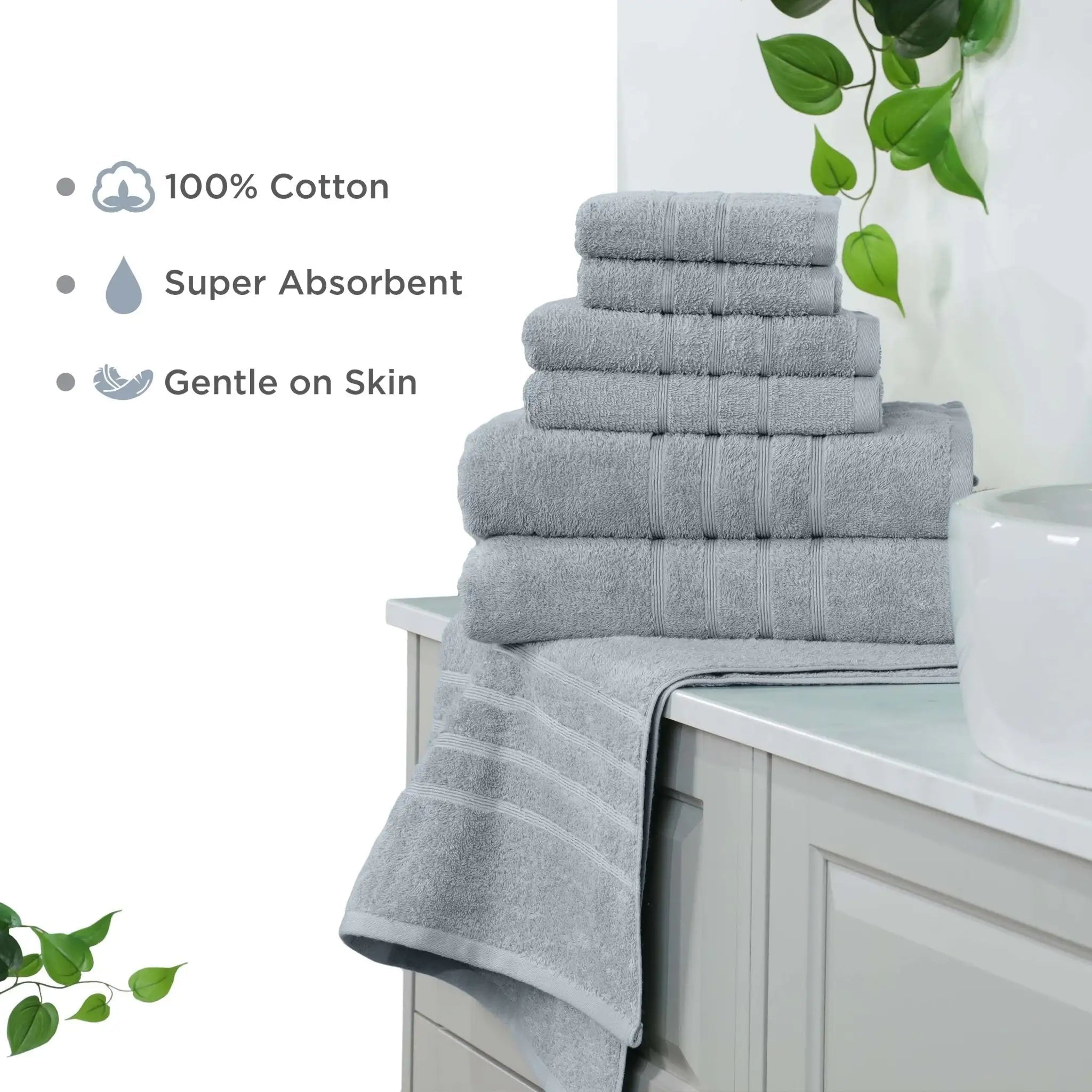Stack of spa blue towel set on a bathroom counter with text highlighting features.