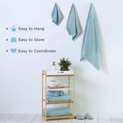 Bathroom setup with towels on a rack and wall, featuring text on ease of use.