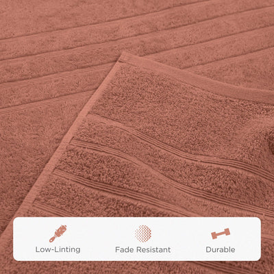 Terracotta towel with texture details and feature icons at the bottom