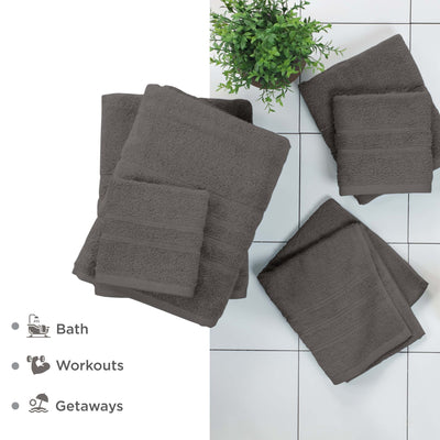 Set of gray towels on a tiled floor.