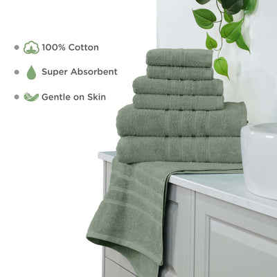 Stack of sage towels on a bathroom counter with text highlighting features.