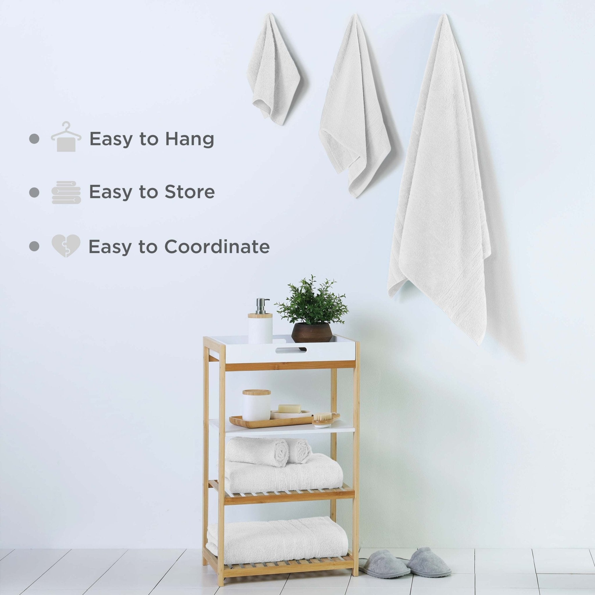 Towel rack with towels hanging on a light blue wall
