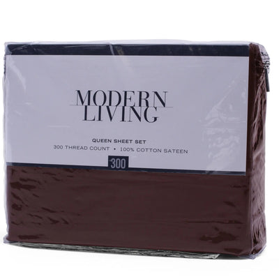 A packaged Modern Living Queen Sheet Set in dark brown cotton sateen, wrapped in clear plastic with a white paper label showing the brand and specifications.