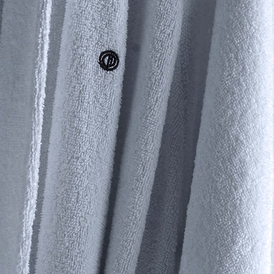 Light gray terry bath robe with low lint texture and a small embroidered logo.