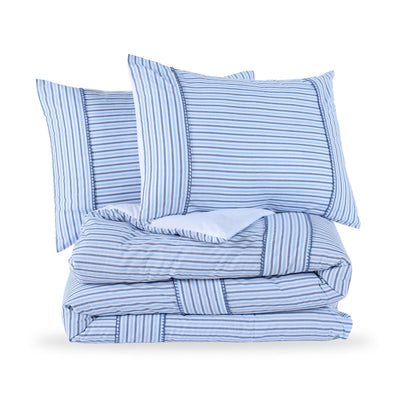 Blue striped comforter set with two shams on a white background