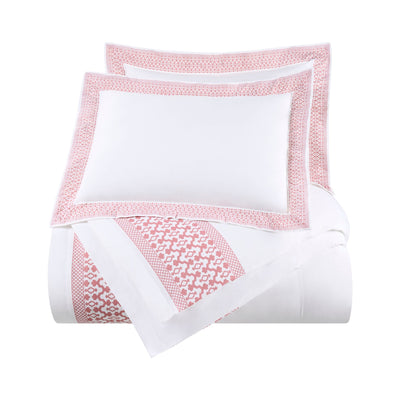 Comforter Set with pink geometric patterns on a white background