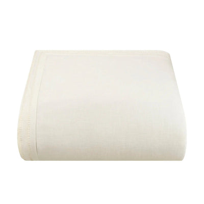 A folded ivory comforter, shown against a plain white background.