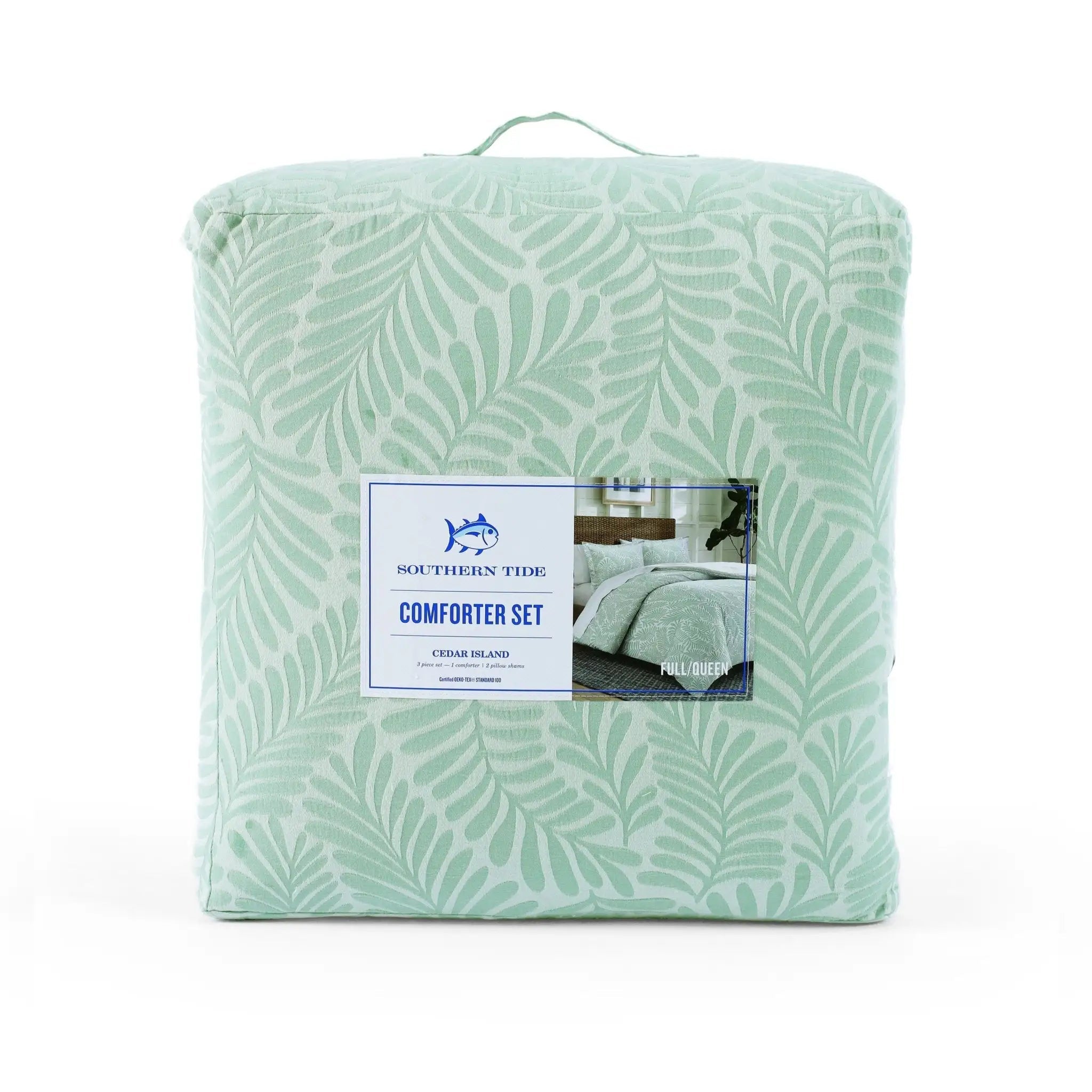 Packaged comforter set with leaf pattern and Southern Tide label on a white background