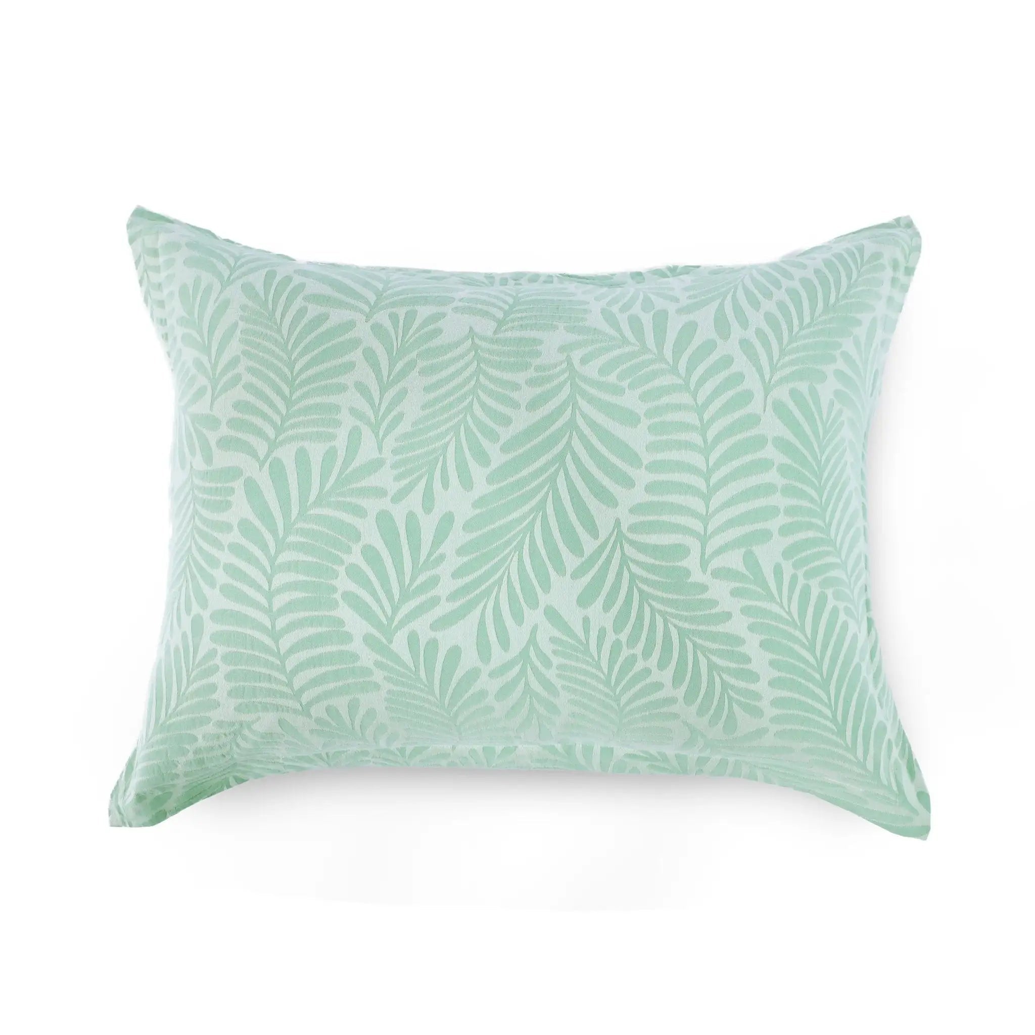 Green leaf-patterned pillow sham on a white background