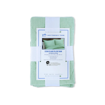 Back view of green euro sham with packaging on a white background