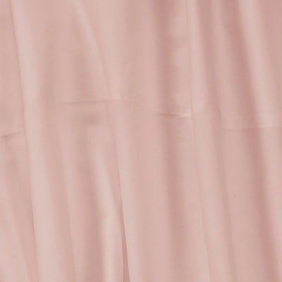 A close-up of draped dusty pink fabric with soft vertical folds and a smooth texture.
