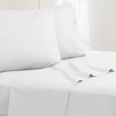 White bed sheet and pillowcase set neatly arranged on a bed.