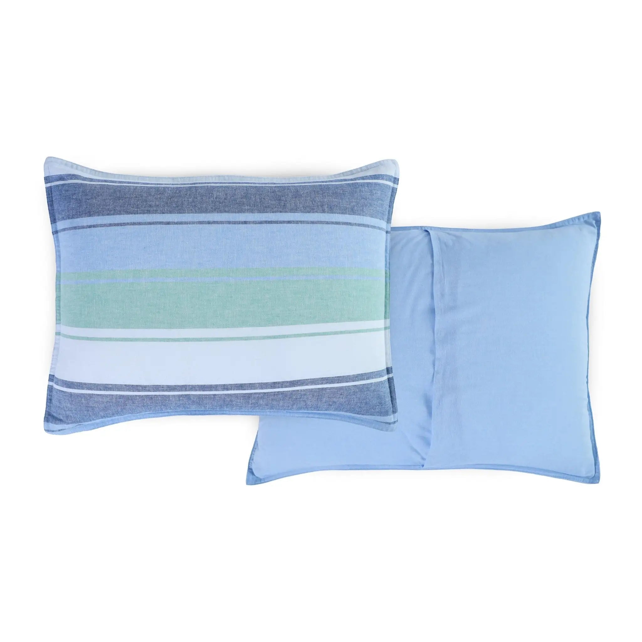 Two pillow shams, one with horizontal stripes and the reverse side solid blue, on a white background.